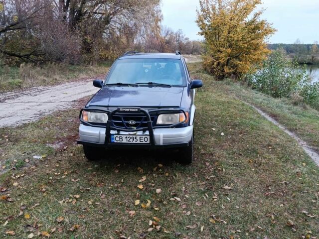 Синий Киа Sportage, объемом двигателя 2 л и пробегом 210 тыс. км за 3300 $, фото 4 на Automoto.ua