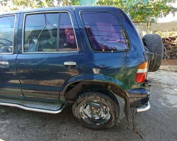 Синий Киа Sportage, объемом двигателя 2 л и пробегом 250 тыс. км за 2999 $, фото 4 на Automoto.ua