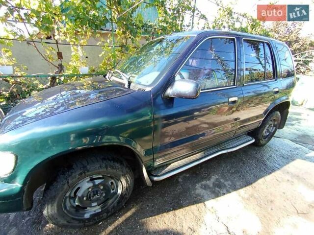 Синий Киа Sportage, объемом двигателя 2 л и пробегом 250 тыс. км за 2999 $, фото 5 на Automoto.ua