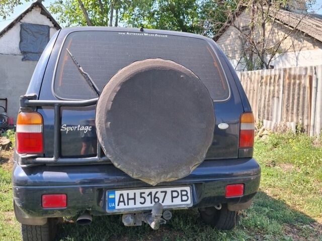 Синій Кіа Sportage, об'ємом двигуна 2 л та пробігом 240 тис. км за 5000 $, фото 6 на Automoto.ua