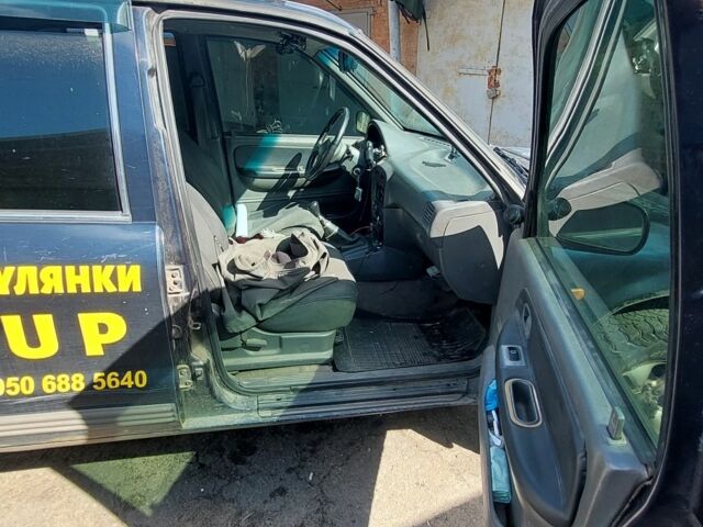 Синий Киа Sportage, объемом двигателя 2 л и пробегом 400 тыс. км за 4000 $, фото 4 на Automoto.ua