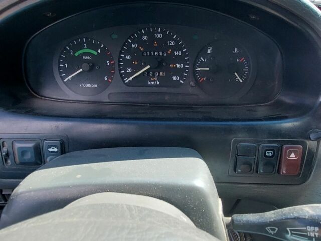 Синий Киа Sportage, объемом двигателя 2 л и пробегом 400 тыс. км за 4000 $, фото 6 на Automoto.ua