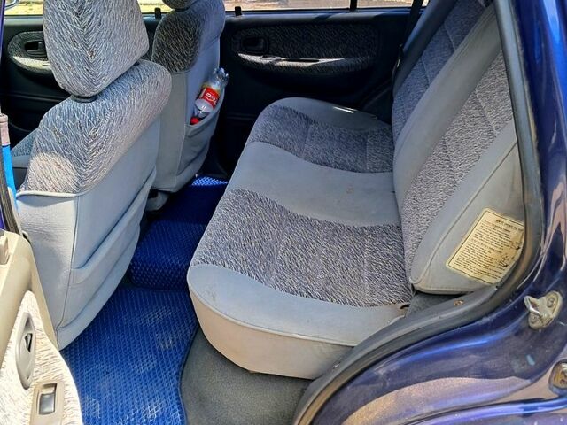 Синій Кіа Sportage, об'ємом двигуна 2 л та пробігом 222 тис. км за 3600 $, фото 5 на Automoto.ua