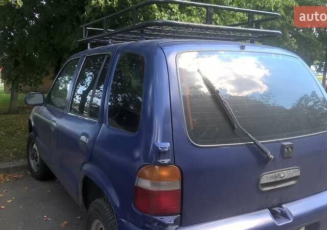 Синий Киа Sportage, объемом двигателя 2 л и пробегом 330 тыс. км за 3999 $, фото 1 на Automoto.ua