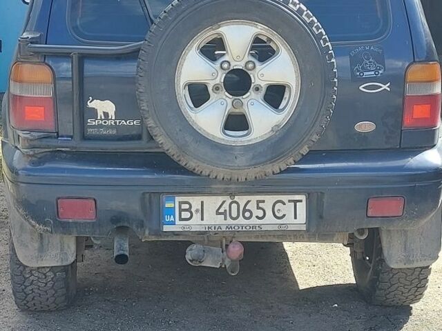 Синий Киа Sportage, объемом двигателя 2 л и пробегом 400 тыс. км за 4000 $, фото 1 на Automoto.ua