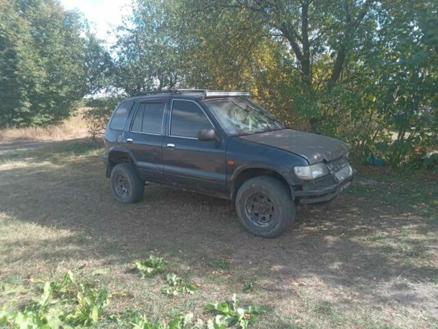 Синий Киа Sportage, объемом двигателя 2 л и пробегом 1 тыс. км за 2200 $, фото 3 на Automoto.ua