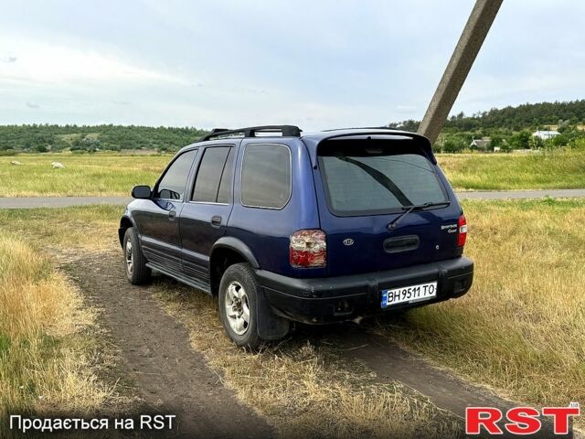 Синій Кіа Sportage, об'ємом двигуна 2 л та пробігом 200 тис. км за 3500 $, фото 2 на Automoto.ua
