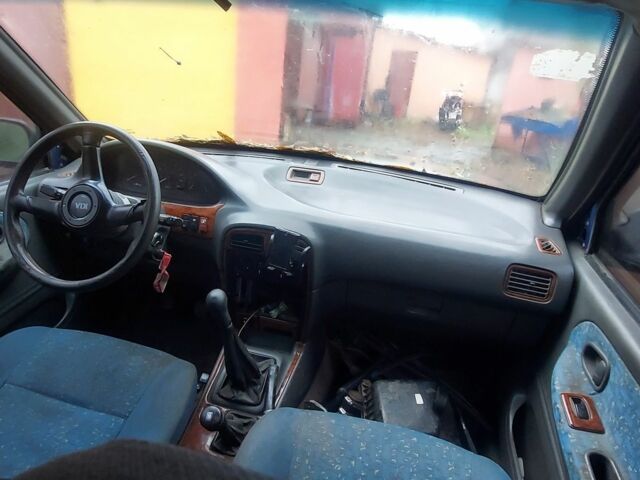 Синий Киа Sportage, объемом двигателя 2 л и пробегом 100 тыс. км за 1200 $, фото 3 на Automoto.ua