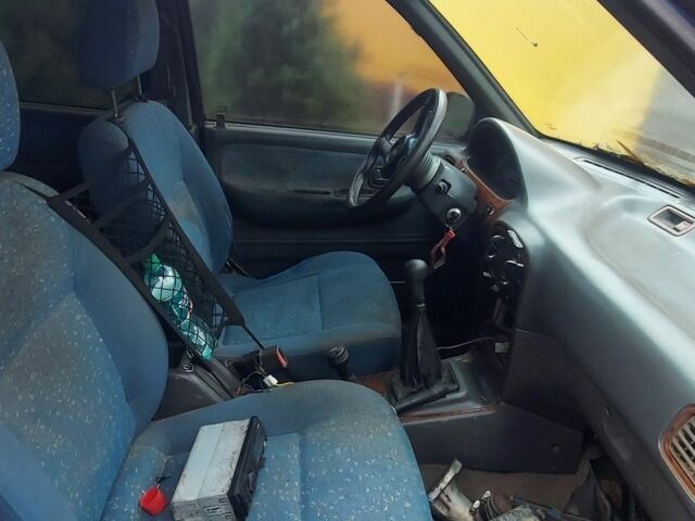 Синий Киа Sportage, объемом двигателя 2 л и пробегом 100 тыс. км за 1200 $, фото 4 на Automoto.ua