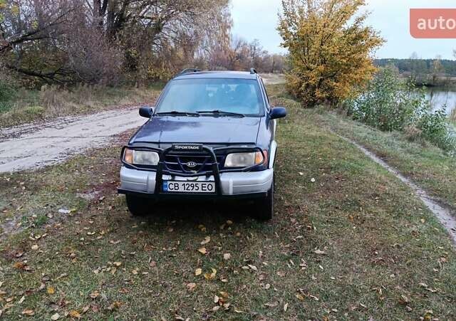 Синий Киа Sportage, объемом двигателя 2 л и пробегом 210 тыс. км за 3300 $, фото 3 на Automoto.ua