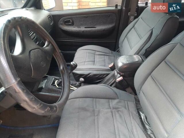 Синій Кіа Sportage, об'ємом двигуна 2 л та пробігом 200 тис. км за 3100 $, фото 6 на Automoto.ua