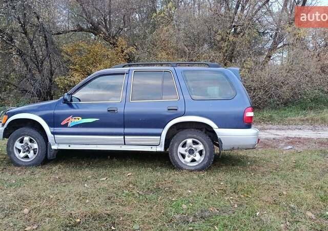 Синий Киа Sportage, объемом двигателя 2 л и пробегом 210 тыс. км за 3300 $, фото 5 на Automoto.ua