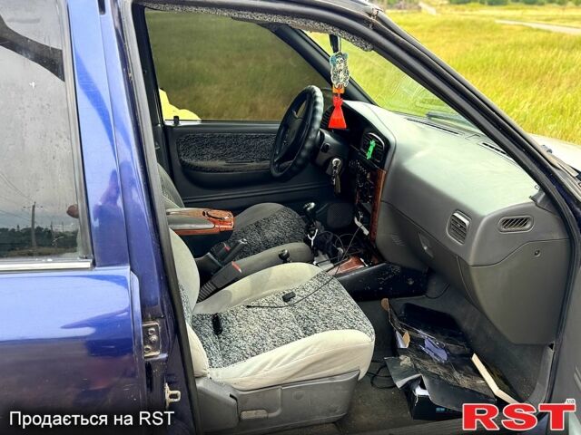 Синій Кіа Sportage, об'ємом двигуна 2 л та пробігом 200 тис. км за 3500 $, фото 4 на Automoto.ua