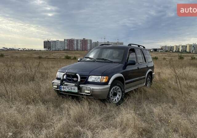 Синий Киа Sportage, объемом двигателя 2 л и пробегом 140 тыс. км за 2200 $, фото 6 на Automoto.ua