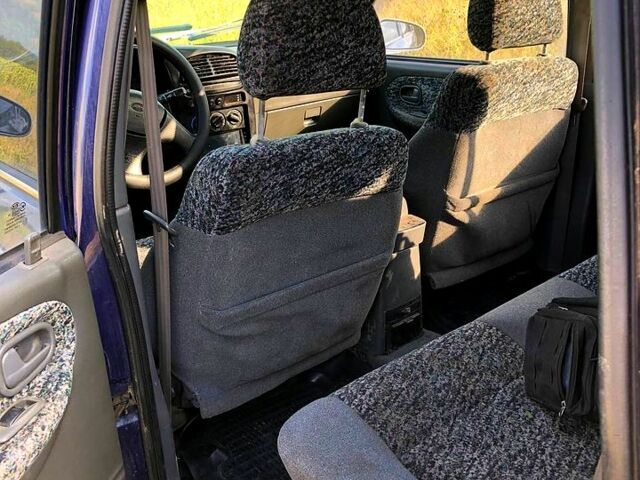 Синій Кіа Sportage, об'ємом двигуна 2 л та пробігом 250 тис. км за 3000 $, фото 4 на Automoto.ua