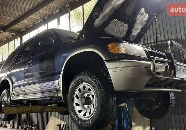 Синий Киа Sportage, объемом двигателя 2 л и пробегом 140 тыс. км за 2200 $, фото 4 на Automoto.ua