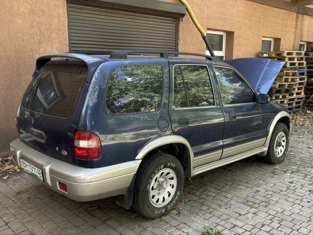 Синий Киа Sportage, объемом двигателя 2 л и пробегом 140 тыс. км за 2200 $, фото 2 на Automoto.ua