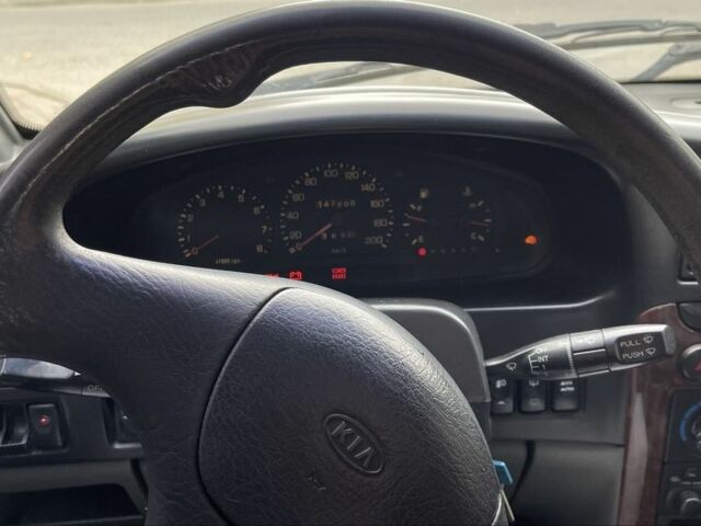 Синий Киа Sportage, объемом двигателя 2 л и пробегом 140 тыс. км за 2200 $, фото 3 на Automoto.ua