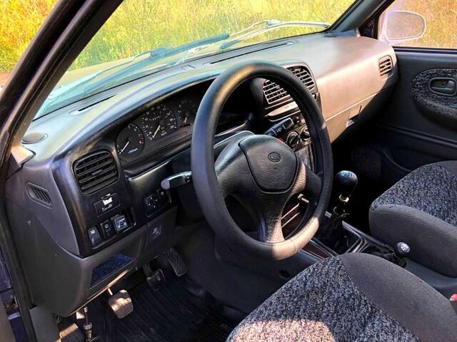 Синій Кіа Sportage, об'ємом двигуна 2 л та пробігом 250 тис. км за 3000 $, фото 5 на Automoto.ua