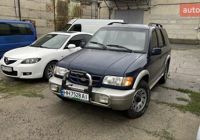 Синий Киа Sportage, объемом двигателя 2 л и пробегом 140 тыс. км за 2200 $, фото 5 на Automoto.ua