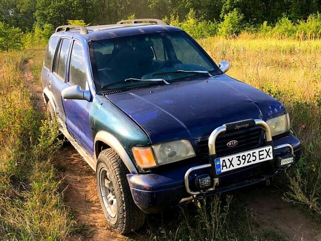 Синій Кіа Sportage, об'ємом двигуна 2 л та пробігом 250 тис. км за 3000 $, фото 1 на Automoto.ua
