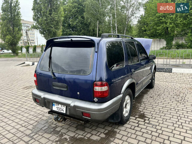 Синий Киа Sportage, объемом двигателя 2 л и пробегом 340 тыс. км за 4500 $, фото 4 на Automoto.ua