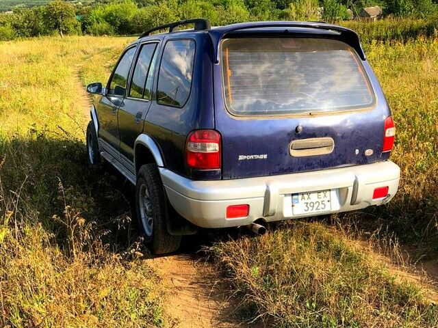 Синій Кіа Sportage, об'ємом двигуна 2 л та пробігом 250 тис. км за 3000 $, фото 2 на Automoto.ua