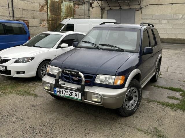 Синий Киа Sportage, объемом двигателя 2 л и пробегом 140 тыс. км за 2200 $, фото 6 на Automoto.ua