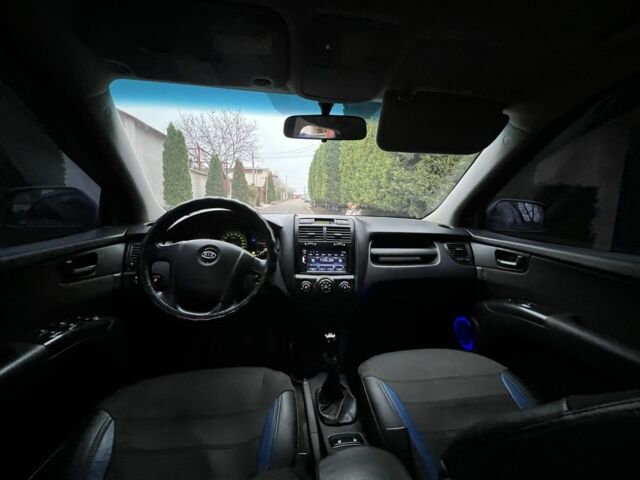Синий Киа Sportage, объемом двигателя 2 л и пробегом 200 тыс. км за 4300 $, фото 4 на Automoto.ua