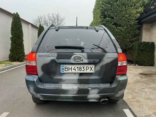 Синий Киа Sportage, объемом двигателя 2 л и пробегом 200 тыс. км за 4300 $, фото 2 на Automoto.ua