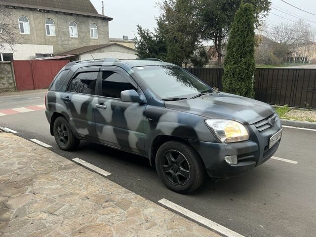 Синий Киа Sportage, объемом двигателя 2 л и пробегом 200 тыс. км за 4300 $, фото 1 на Automoto.ua