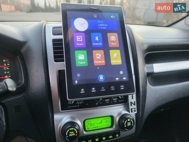 Синий Киа Sportage, объемом двигателя 1.98 л и пробегом 258 тыс. км за 7400 $, фото 118 на Automoto.ua