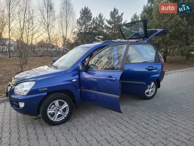 Синий Киа Sportage, объемом двигателя 1.98 л и пробегом 258 тыс. км за 7400 $, фото 51 на Automoto.ua