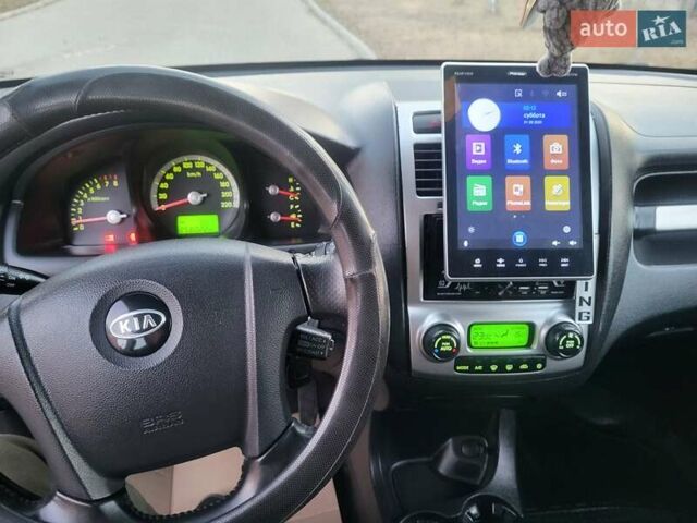 Синий Киа Sportage, объемом двигателя 1.98 л и пробегом 258 тыс. км за 7400 $, фото 120 на Automoto.ua