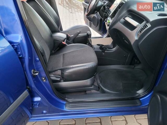 Синий Киа Sportage, объемом двигателя 1.98 л и пробегом 258 тыс. км за 7400 $, фото 81 на Automoto.ua
