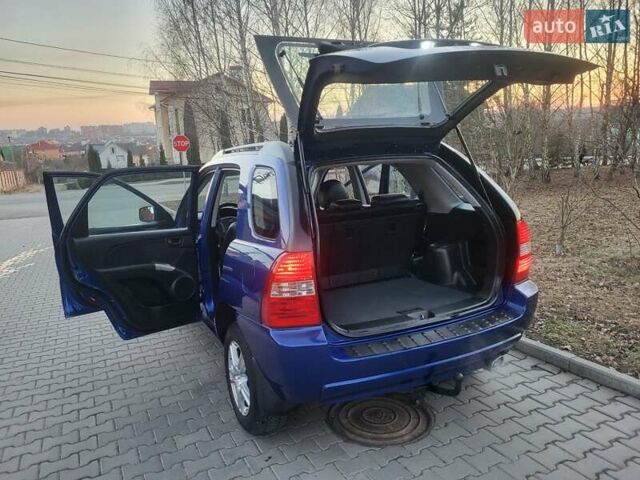 Синий Киа Sportage, объемом двигателя 1.98 л и пробегом 258 тыс. км за 7400 $, фото 58 на Automoto.ua