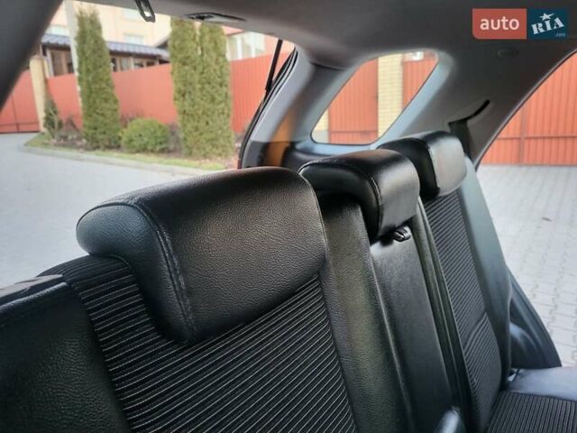 Синий Киа Sportage, объемом двигателя 1.98 л и пробегом 258 тыс. км за 7400 $, фото 93 на Automoto.ua