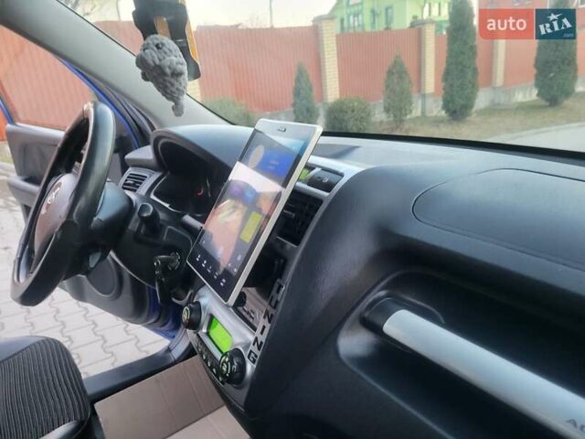 Синий Киа Sportage, объемом двигателя 1.98 л и пробегом 258 тыс. км за 7400 $, фото 111 на Automoto.ua