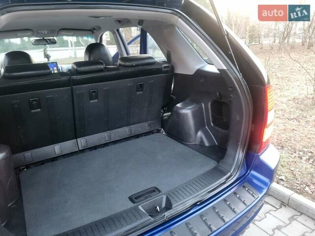 Синий Киа Sportage, объемом двигателя 1.98 л и пробегом 258 тыс. км за 7400 $, фото 96 на Automoto.ua