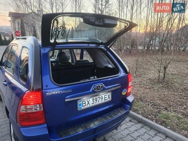 Синий Киа Sportage, объемом двигателя 1.98 л и пробегом 258 тыс. км за 7400 $, фото 46 на Automoto.ua