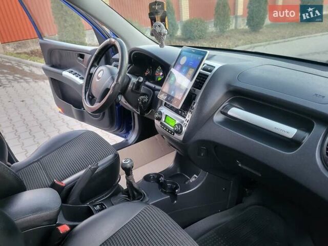 Синий Киа Sportage, объемом двигателя 1.98 л и пробегом 258 тыс. км за 7400 $, фото 80 на Automoto.ua