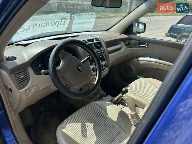 Синій Кіа Sportage, об'ємом двигуна 2 л та пробігом 460 тис. км за 3634 $, фото 4 на Automoto.ua