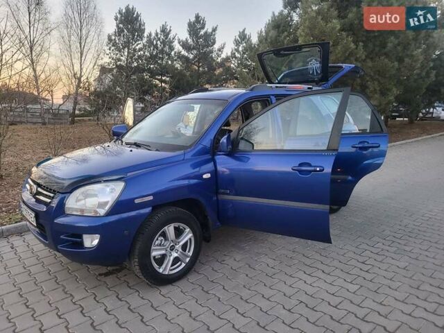 Синий Киа Sportage, объемом двигателя 1.98 л и пробегом 258 тыс. км за 7400 $, фото 50 на Automoto.ua