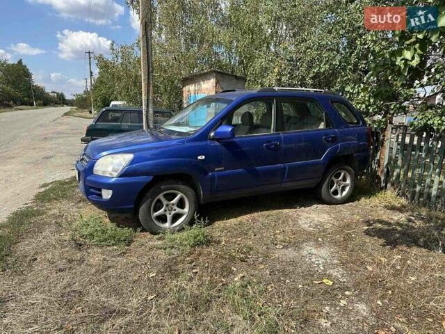 Синій Кіа Sportage, об'ємом двигуна 2 л та пробігом 460 тис. км за 3634 $, фото 1 на Automoto.ua