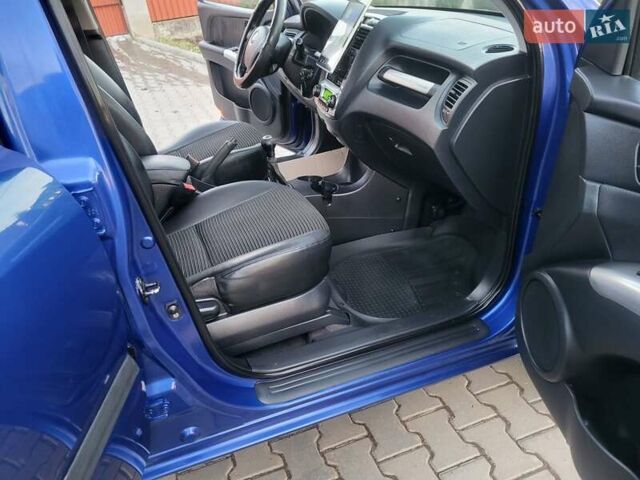 Синий Киа Sportage, объемом двигателя 1.98 л и пробегом 258 тыс. км за 7400 $, фото 78 на Automoto.ua