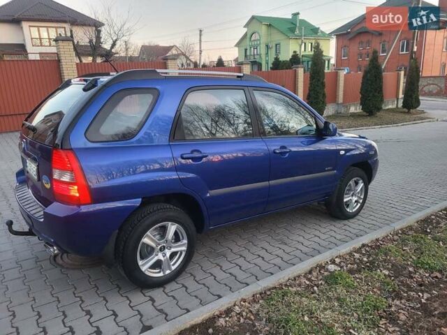 Синий Киа Sportage, объемом двигателя 1.98 л и пробегом 258 тыс. км за 7400 $, фото 38 на Automoto.ua