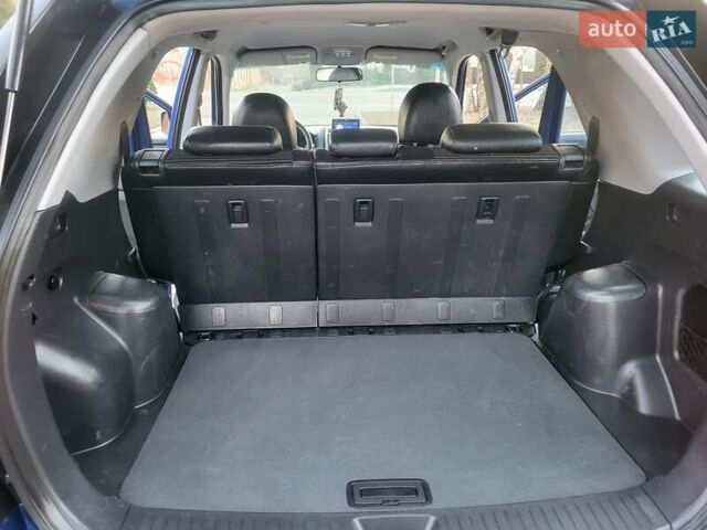 Синий Киа Sportage, объемом двигателя 1.98 л и пробегом 258 тыс. км за 7400 $, фото 94 на Automoto.ua