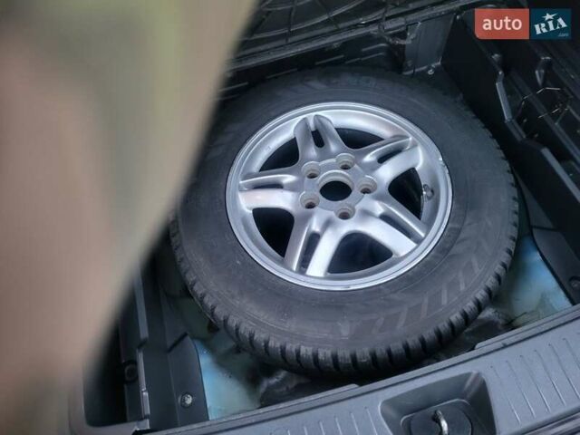 Синий Киа Sportage, объемом двигателя 1.98 л и пробегом 258 тыс. км за 7400 $, фото 97 на Automoto.ua