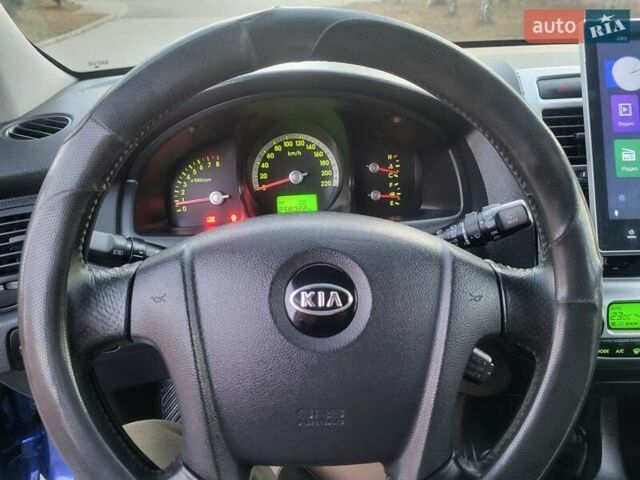 Синий Киа Sportage, объемом двигателя 1.98 л и пробегом 258 тыс. км за 7400 $, фото 115 на Automoto.ua