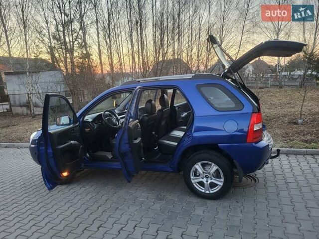 Синий Киа Sportage, объемом двигателя 1.98 л и пробегом 258 тыс. км за 7400 $, фото 55 на Automoto.ua